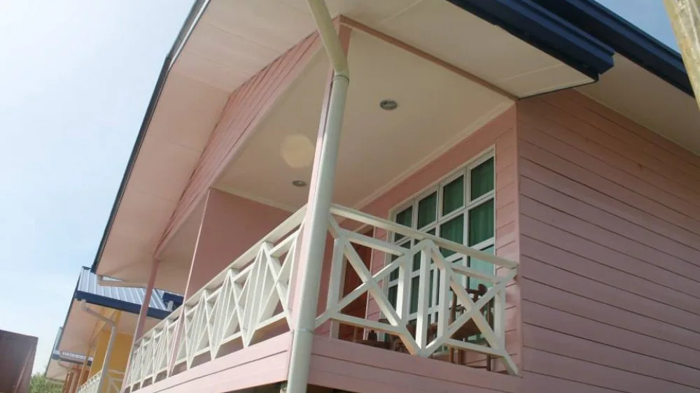 Balcony outside a colourful highland accommodation room