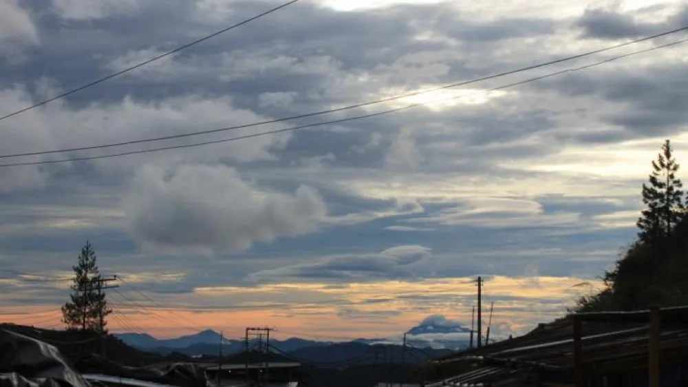 Cloudy evening sky above rooftops in the Kundasang highlands