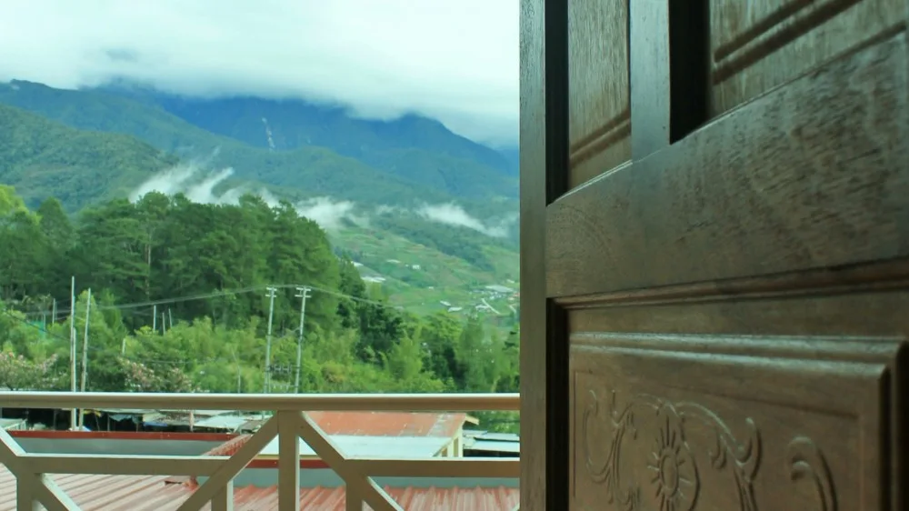 Highland view from the doorway of a guest accommodation room